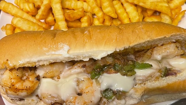 # 26 GRILLED SHRIMP SANDWICH.