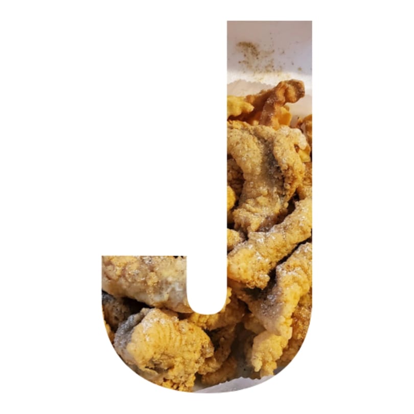 Golden-brown fried chicken pieces, lightly seasoned, filling the shape of the letter 'J'.